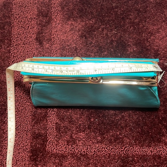 TURQUOISE WITH GOLD TRIM FITTED HANDBAG IS ALSO A CROSSBODY PURSE. - Picture 13 of 16